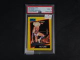 a close up of a wrestling card on a black surface
