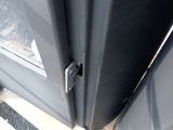a close up of a door with a metal handle