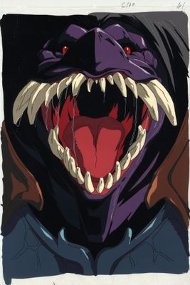 une image montrant un gros plan du visage d'un monstre à la grande bouche