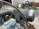 a small engine that is sitting on the ground
