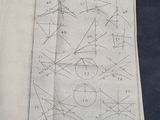 an old book with a drawing of a diagram on it