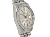 a close up of a wrist watch with a white dial