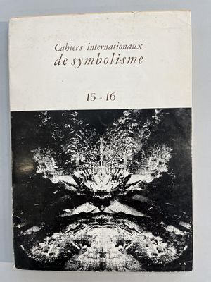an old book with a black and white image of a cat