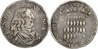 a silver coin with an image of a man on it