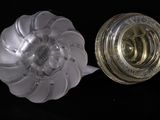 two glass knobs that are next to each other