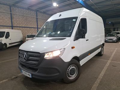 the white van is parked in a parking lot with other vehicles