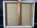 an old wooden easel with a piece of fabric on top of it