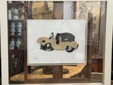 a picture of a picture of a car in a glass case