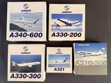 four boxes of airplus airliner cards sitting on top of a table