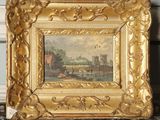 tableau représentant la vue d'un château, dans un cadre doré
