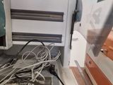 a machine that is sitting on the floor in the room