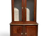 an image of a wooden cabinet with glass doors and a marble top