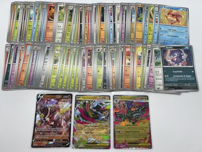 many different types of pokemon cards on the table