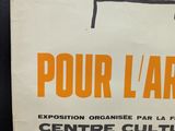a sign that says pour l ' arrete on it