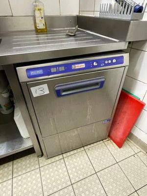 a dishwasher and a sink in a small kitchen