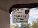 a close up of a business card attached to a car window