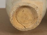 a close up of a vase on a table