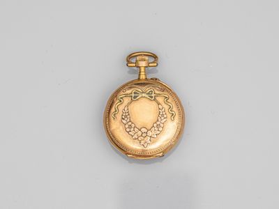 an image of a gold pocket watch with a chain around it