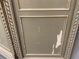 a white cabinet with a mirror on the top of it