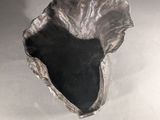 a silver object that is sitting on a table