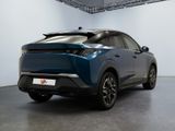 the rear end of a blue toyota c - hr parked in a garage