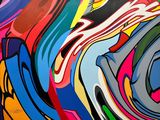 brightly colored abstract painting on a wall in an art gallery