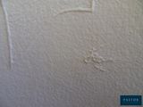 a close up of a piece of paper with a cross drawn on it