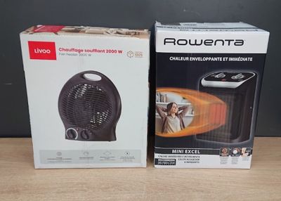 two boxes of powerta heaters sitting on a table next to each other