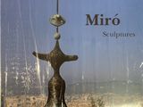 an image of a book with a statue on top of it