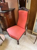 Chauffeuse en acajou et placage d’acajou le dossier à décor …