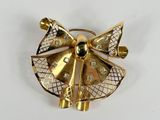 une image représentant une broche ou une épingle en forme d'ange, en or et diamants