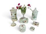 many different types of decorative items displayed on the table