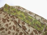 an image of a close up of a camouflage pants on a white surface