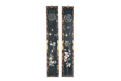 pair of oriental wall hangings with flowers and birds