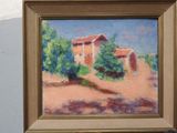une photo d'un tableau représentant une maison accrochée à un mur