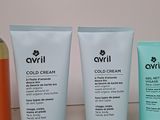 several different types of skin care products are lined up on a shelf