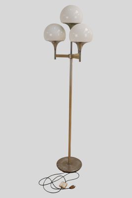 a close up of a lamp on a stand with a cord