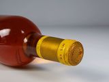 a bottle of wine that is sitting on a table