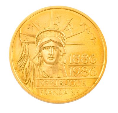 pièce d'or à l'effigie de la Statue de la Liberté