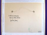 a painting on a easel with a quote written on it