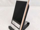 a cell phone that is sitting on a stand