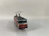 a toy fire truck that is sitting on a white surface