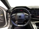 the interior of a car with a steering wheel and dashboard controls