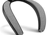 a close up of a pair of bluetooth headsets on a white surface