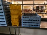 many crates on the table in the store
