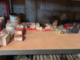 a table with many boxes of items on it