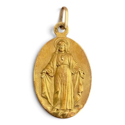 une image représentant une médaille d'or sur laquelle figure une effigie de Jésus