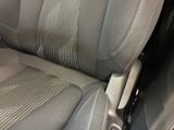 a close up view of a car ' s front seats
