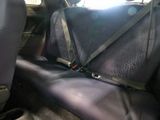 a seat belt in the back of a car