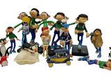 many figurines of different characters on a white background
